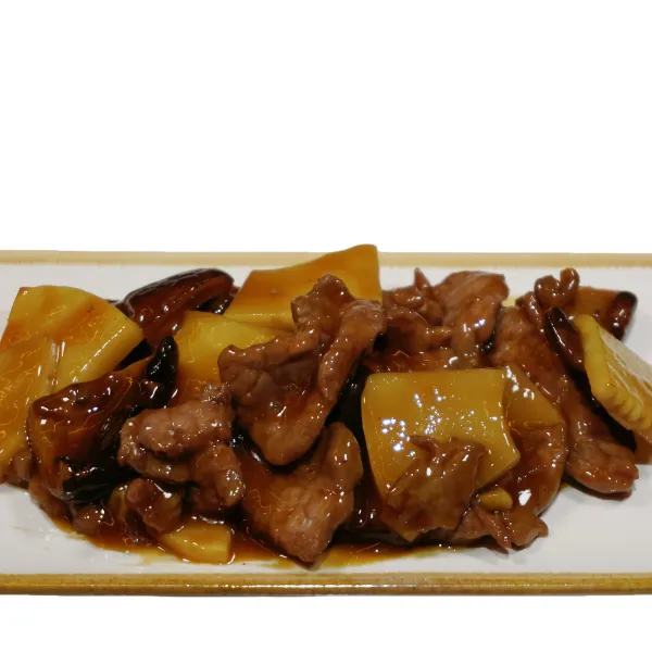 Ternera con bambú y setas